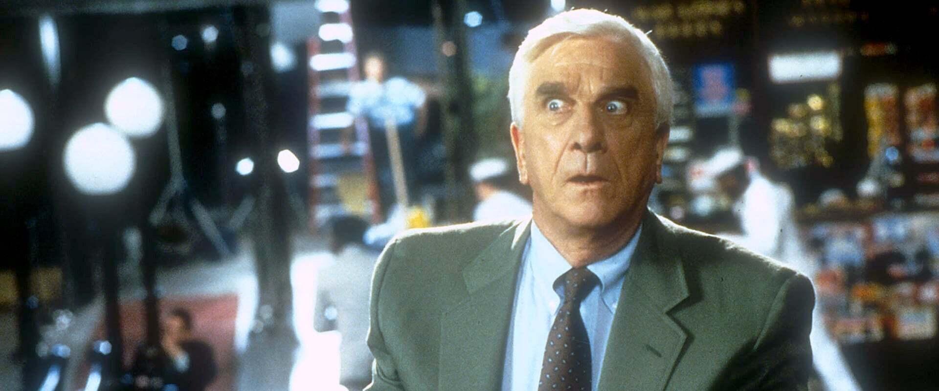 Naked Gun 33⅓: The Final Insult backdrop