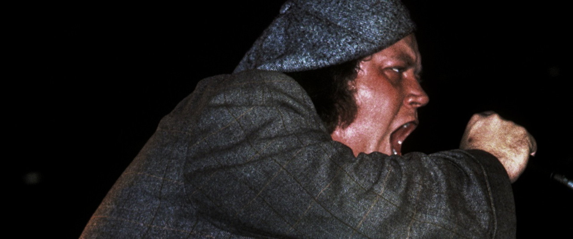 I Am Sam Kinison backdrop