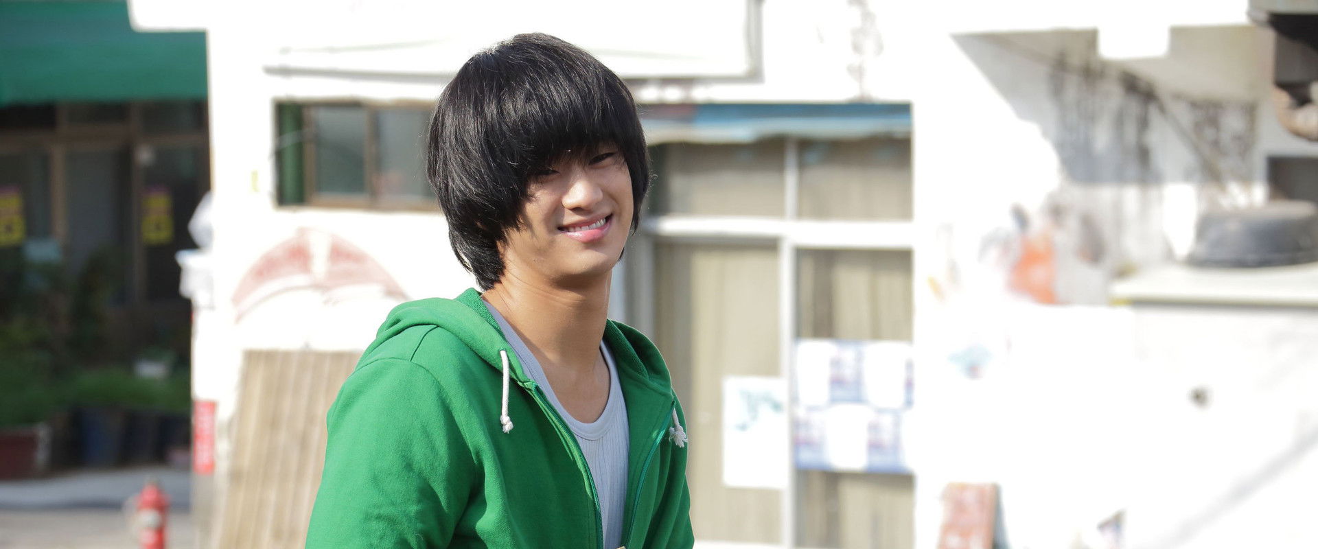 Secretly, Greatly backdrop