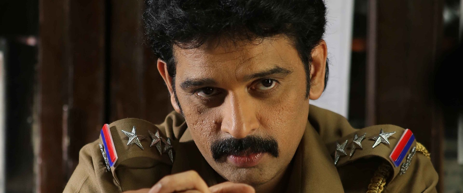 Marainthirunthu Paarkum Marmam Enna backdrop