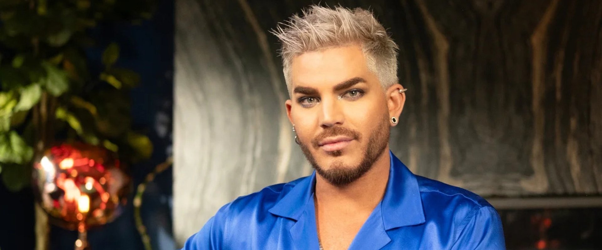 Adam Lambert: Out, Loud and Proud backdrop