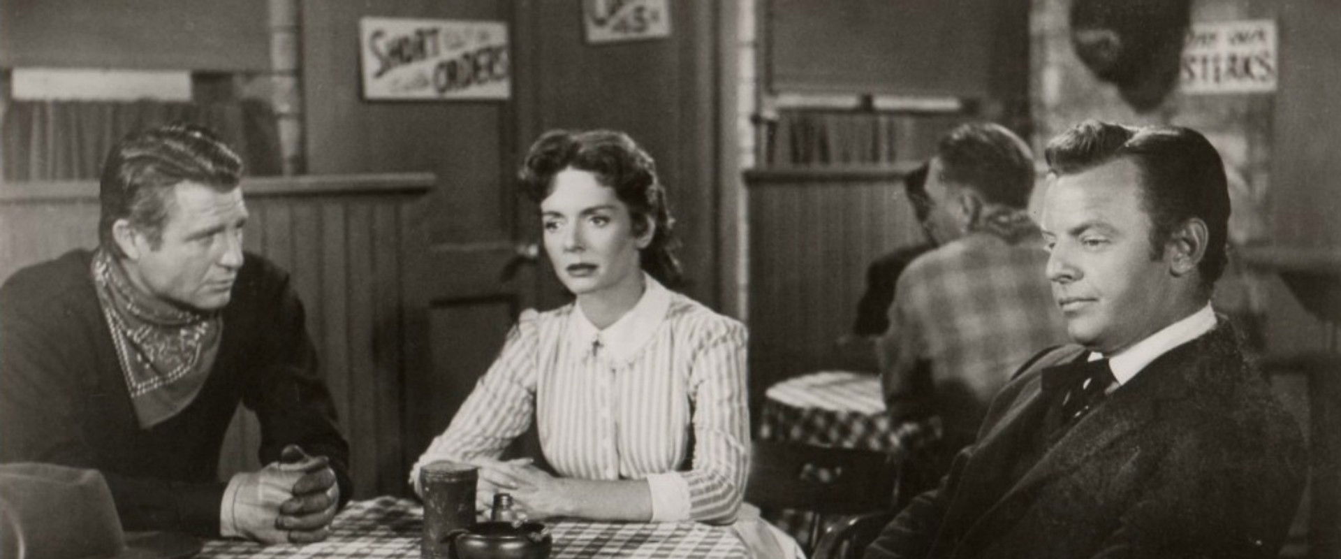 The Badge of Marshal Brennan backdrop