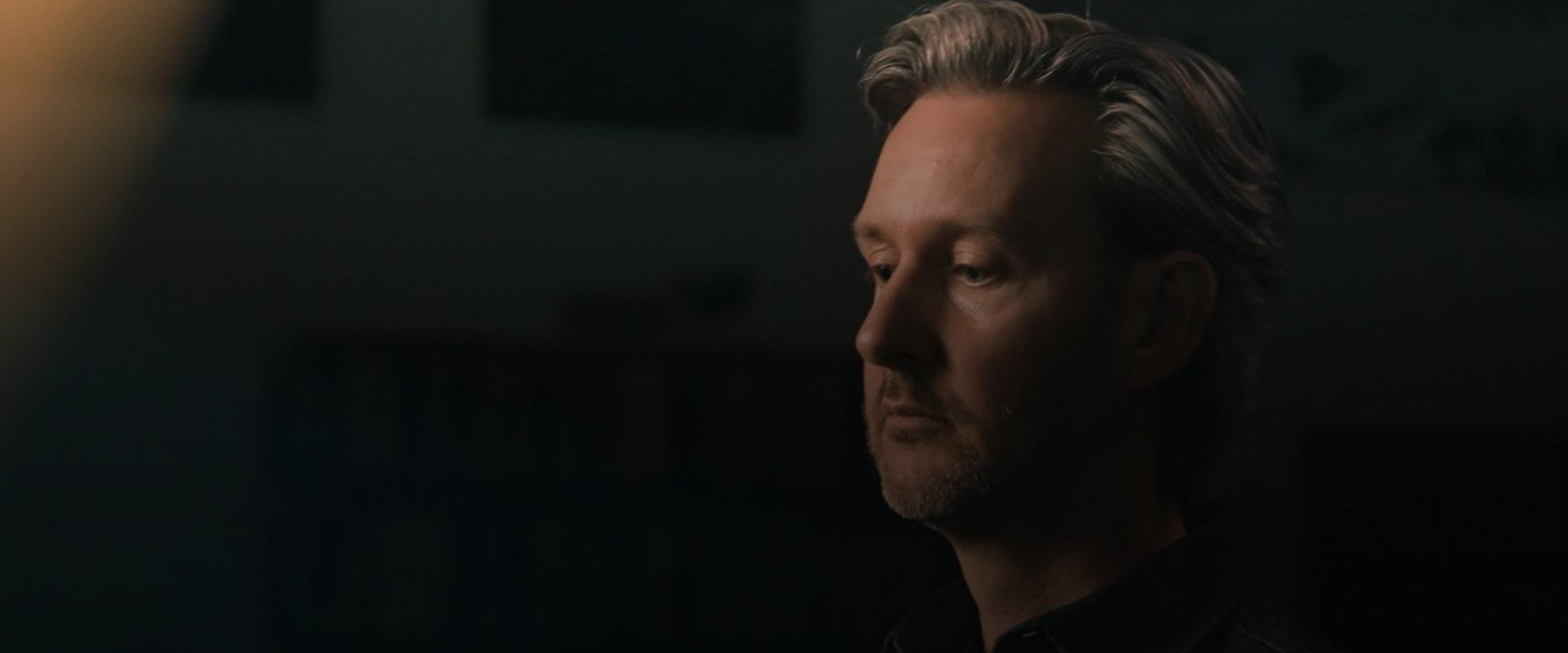 A Cursed Man backdrop