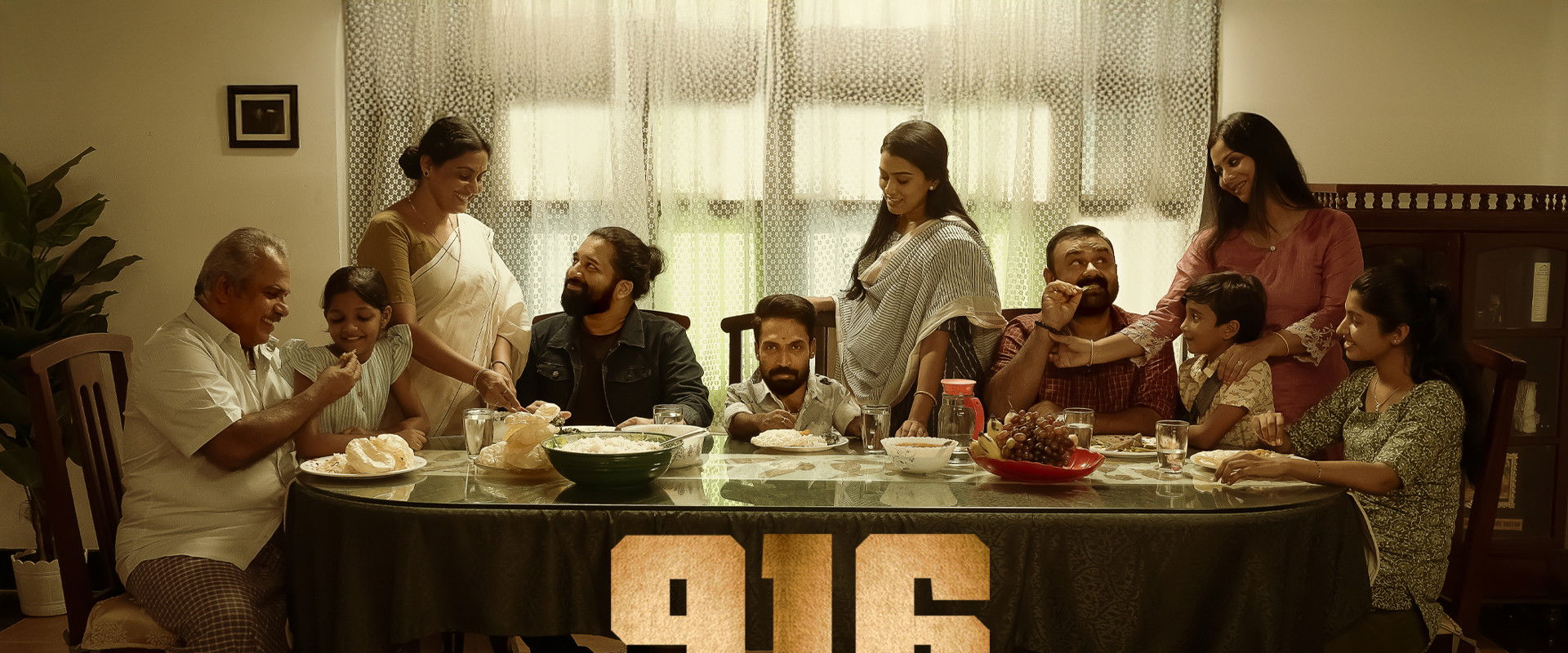 916 Kunjoottan backdrop