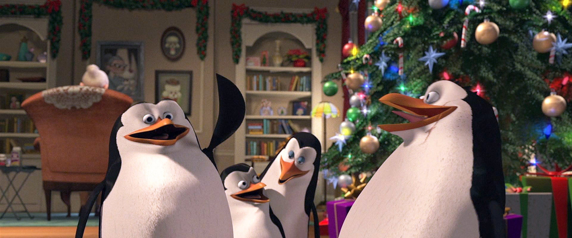 The Madagascar Penguins in a Christmas Caper backdrop