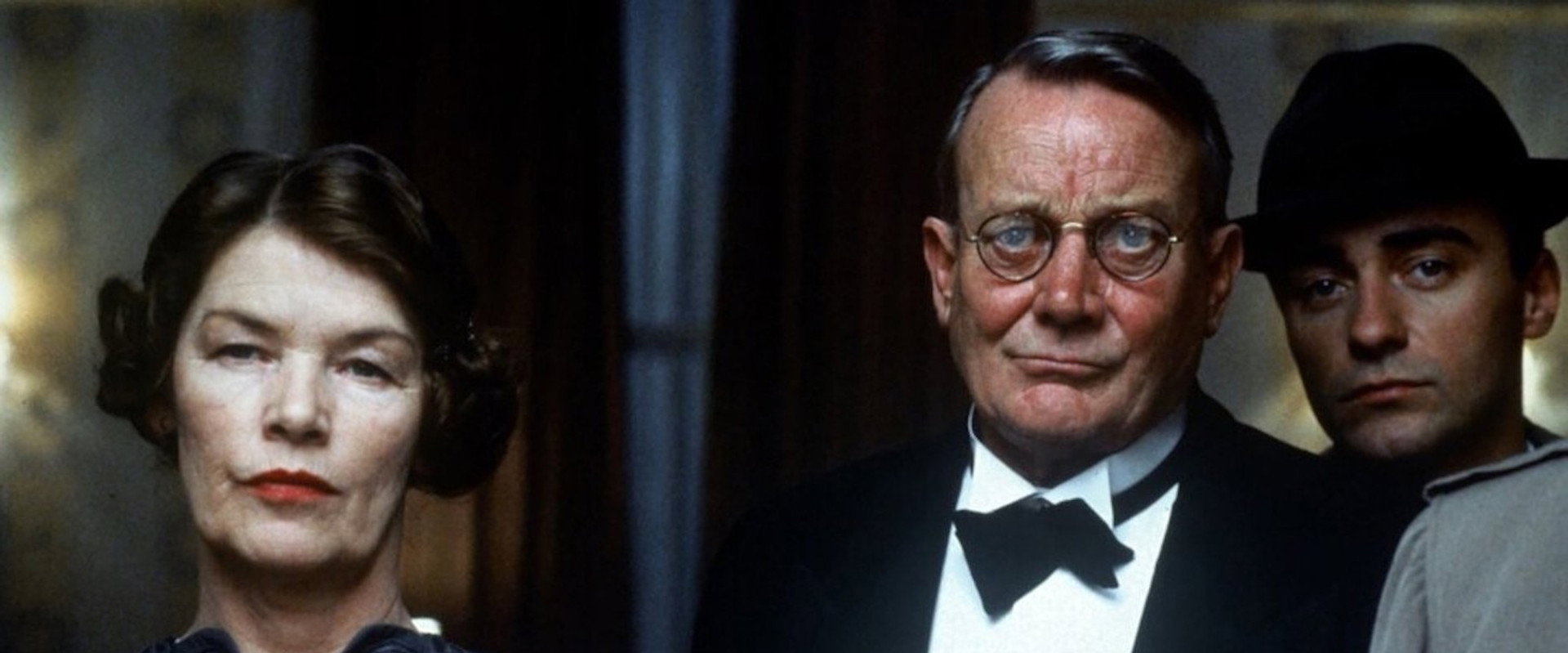 A Murder of Quality backdrop