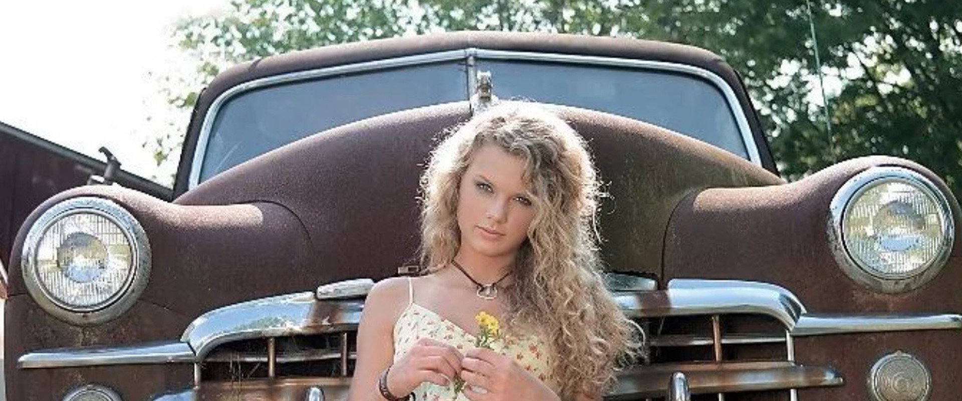 Taylor Swift: A Place in This World backdrop