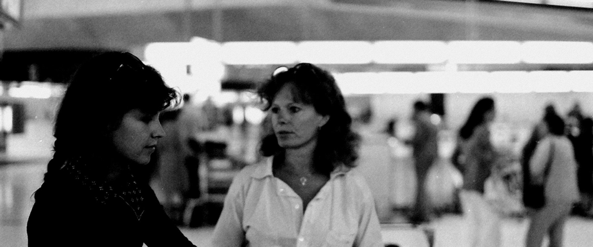 Delphine and Carole backdrop