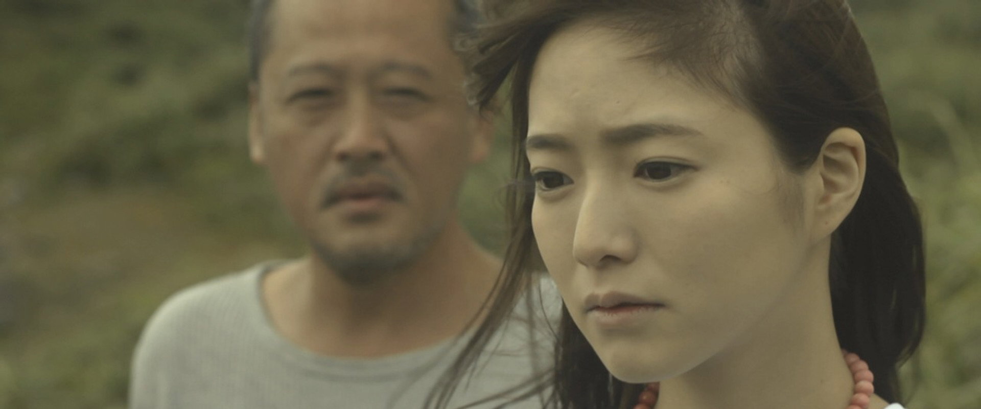 The Beach of Reunion: The Woman Who Slept with Regret backdrop