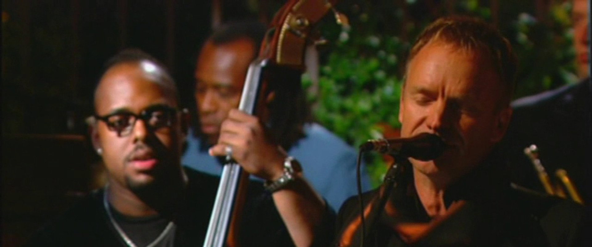Sting: All this Time backdrop
