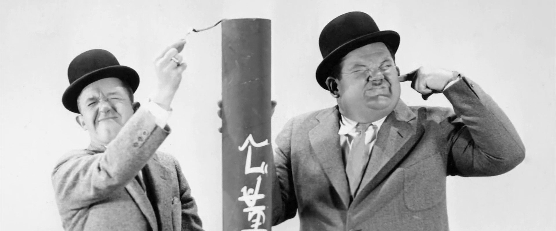 Laurel & Hardy: Their Lives and Magic backdrop