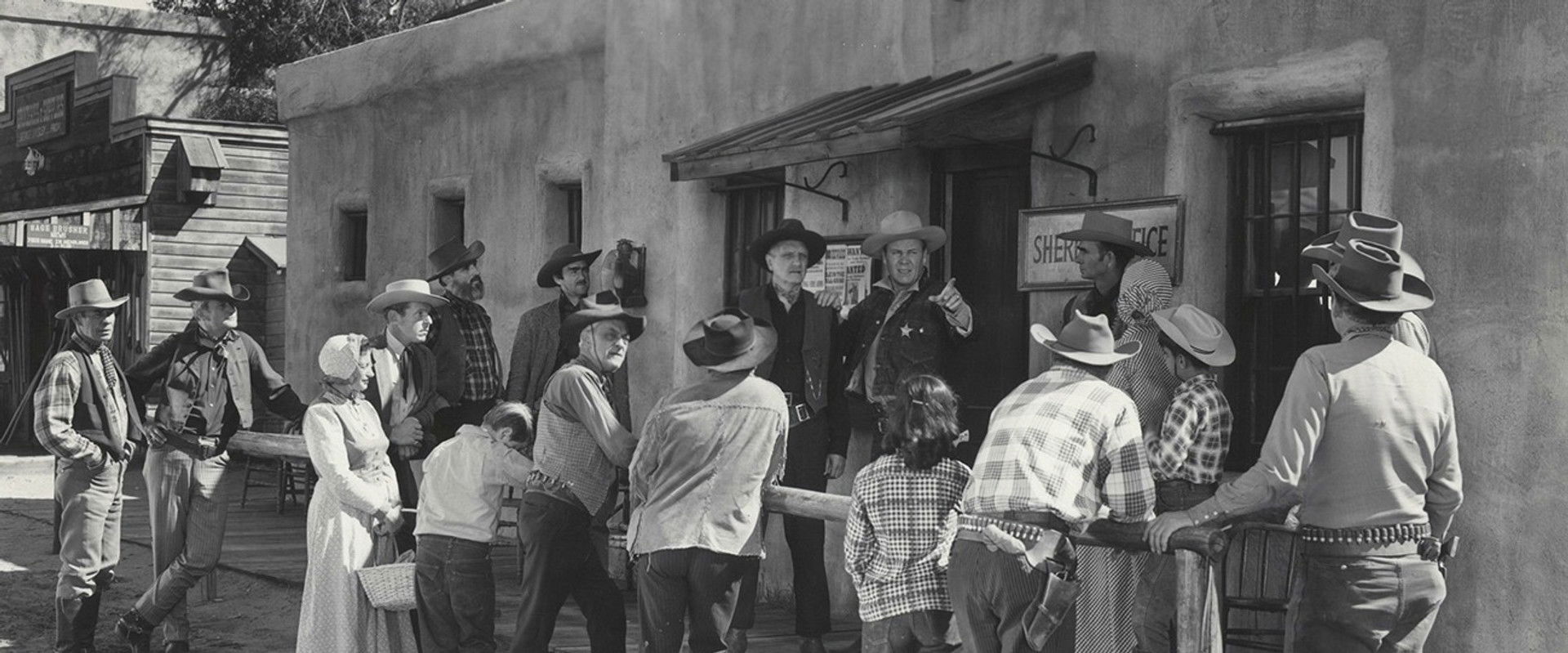 Two Guns and a Badge backdrop
