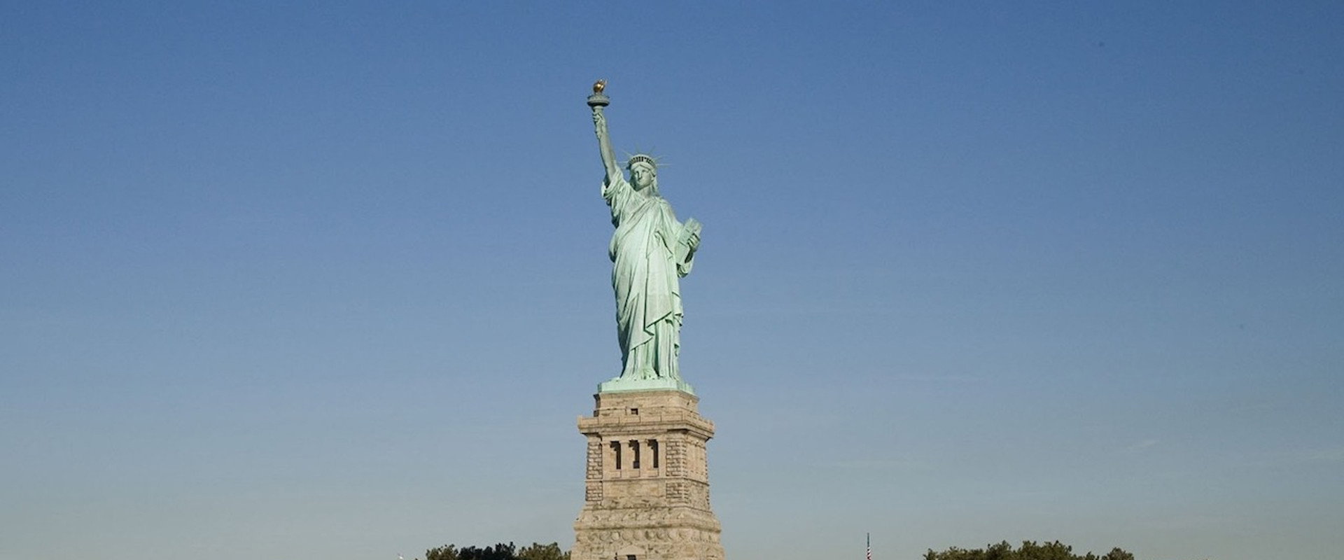 Lady by the Sea: The Statue of Liberty backdrop