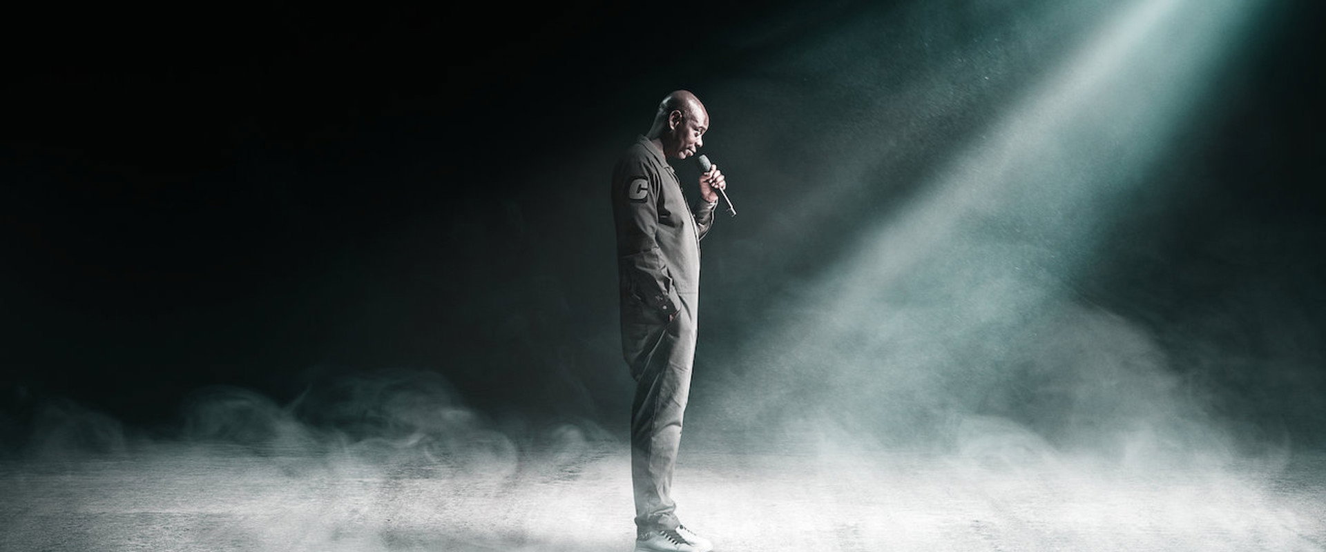 Dave Chappelle: Sticks & Stones backdrop