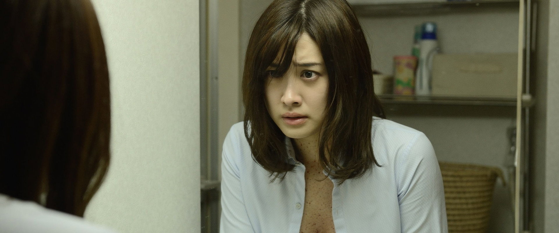 The Woman Who Keeps a Murderer backdrop