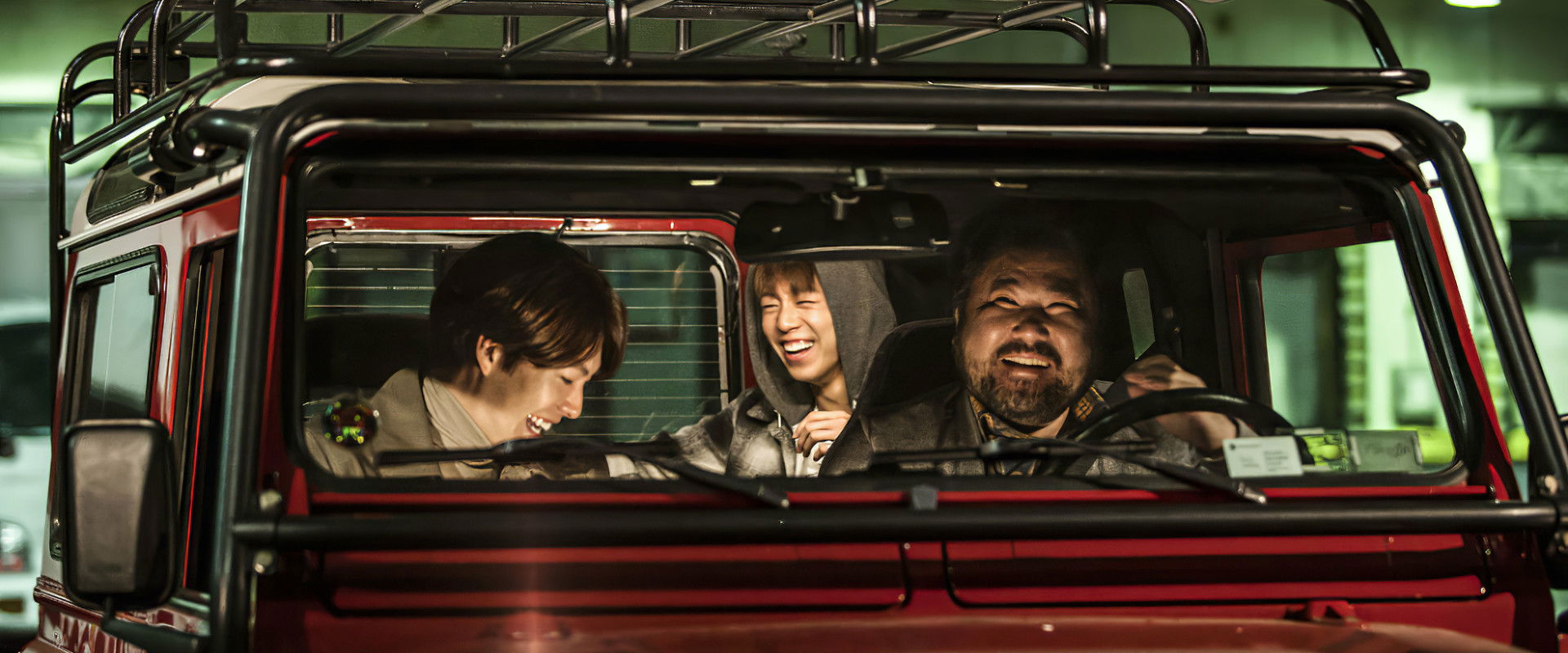 The Con Artists backdrop