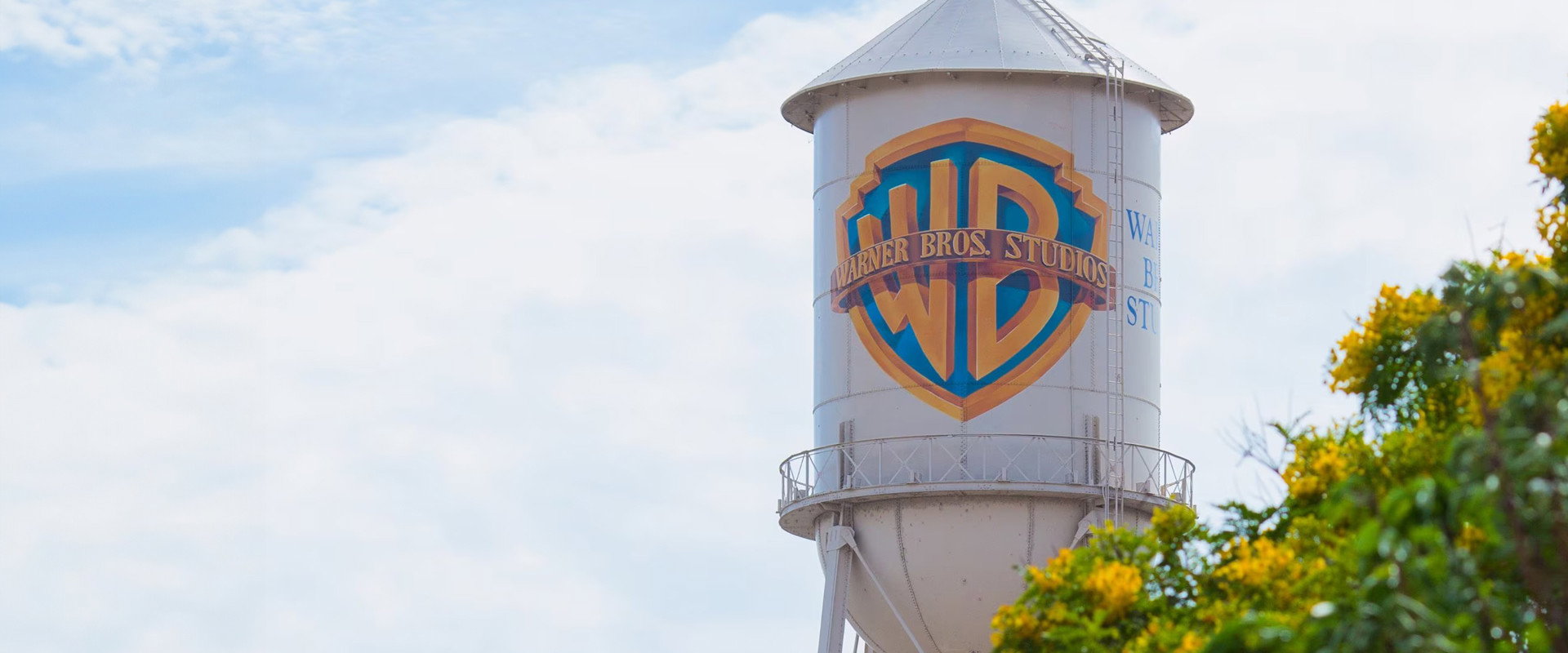 Warner Bros. 75th Anniversary: No Guts, No Glory backdrop