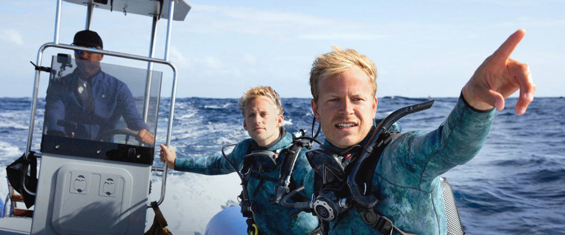Dolphins Up Close with Bertie Gregory backdrop