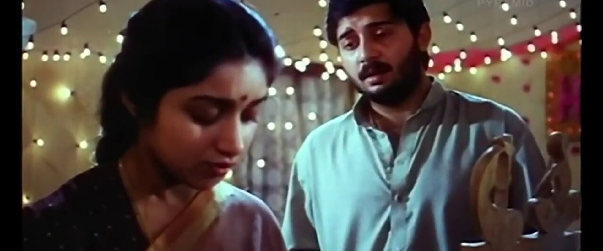 Marupadiyum backdrop