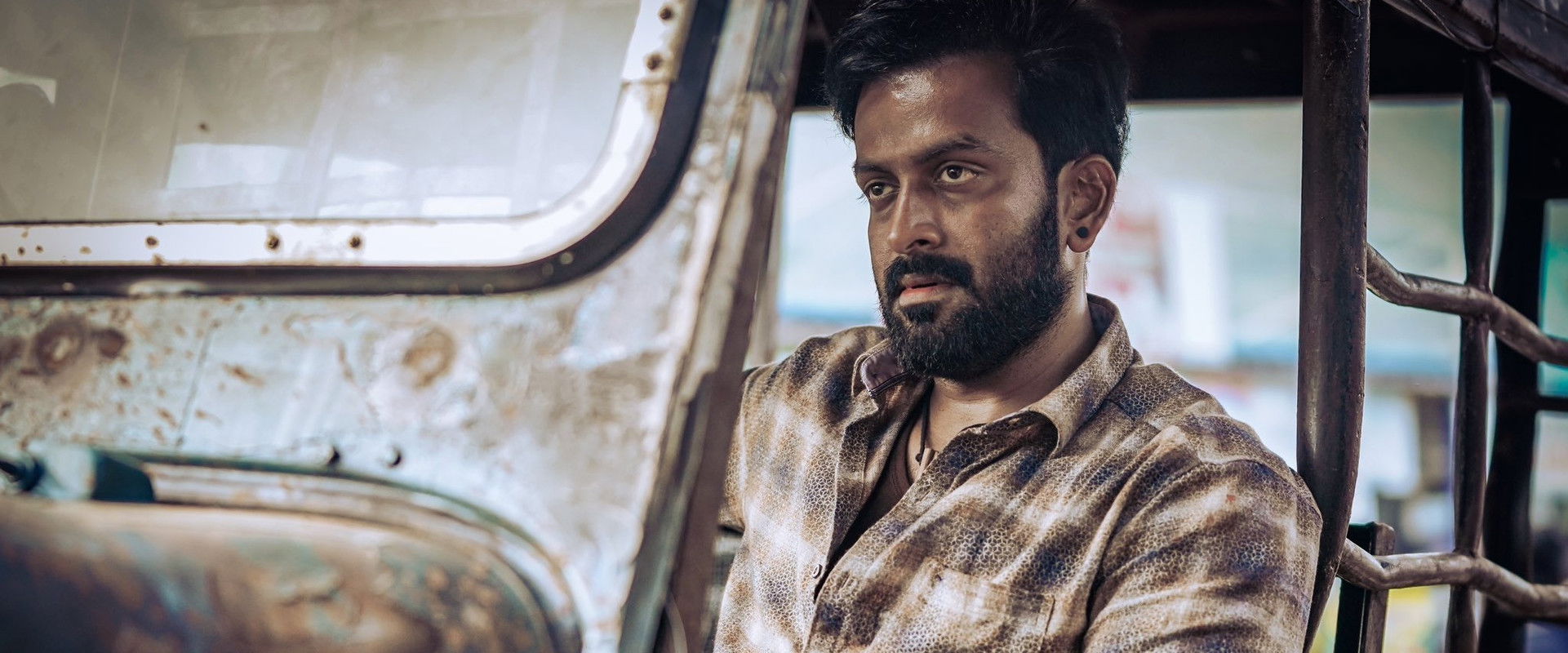 Vilaayath Budha backdrop