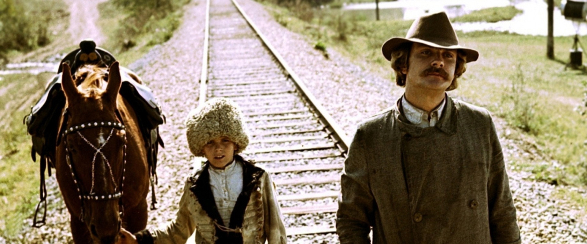 At Home Among Strangers, a Stranger Among His Own backdrop