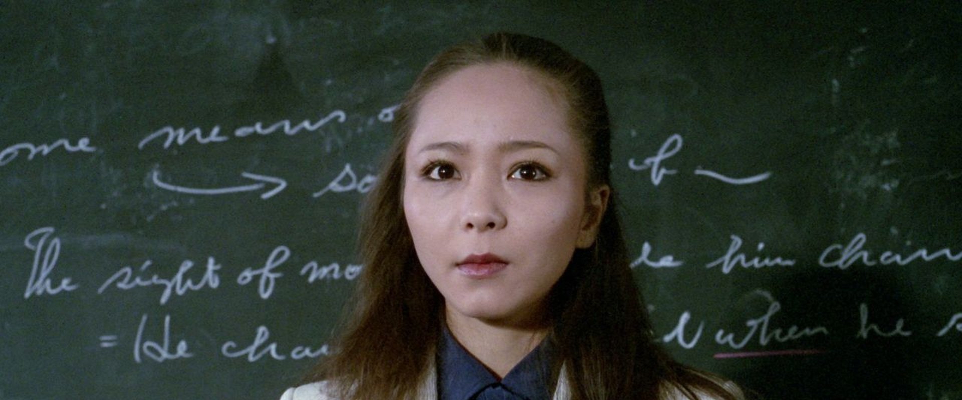 Female Teacher: In Front of the Students