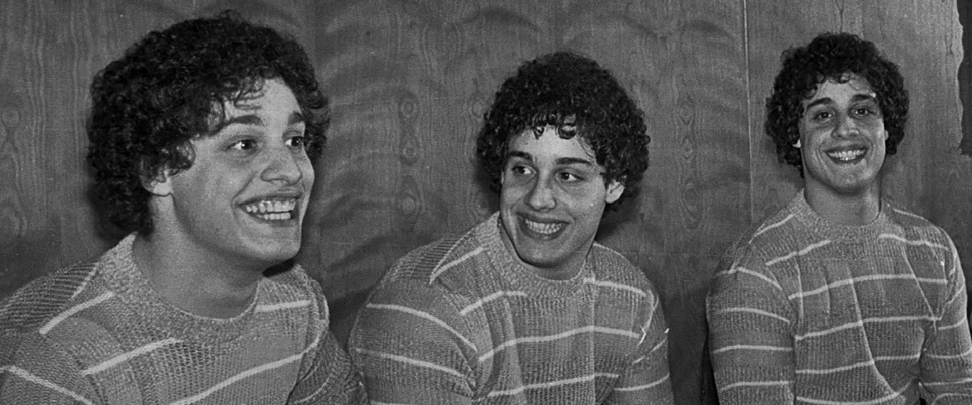 Three Identical Strangers