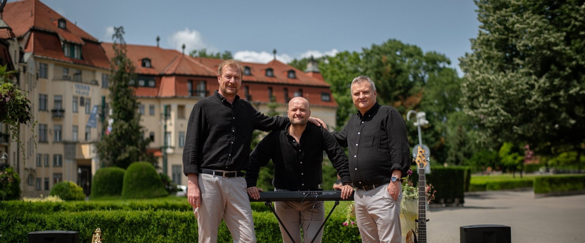 Three elegant men's banner image