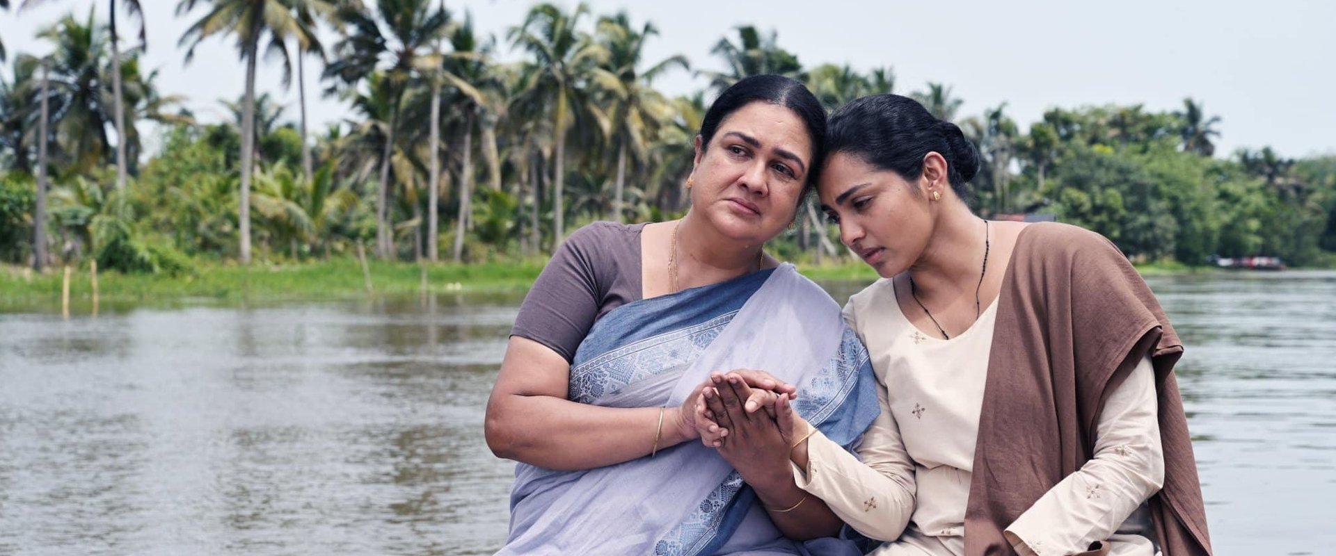 ഉള്ളൊഴുക്ക് filmi için arka plan görseli