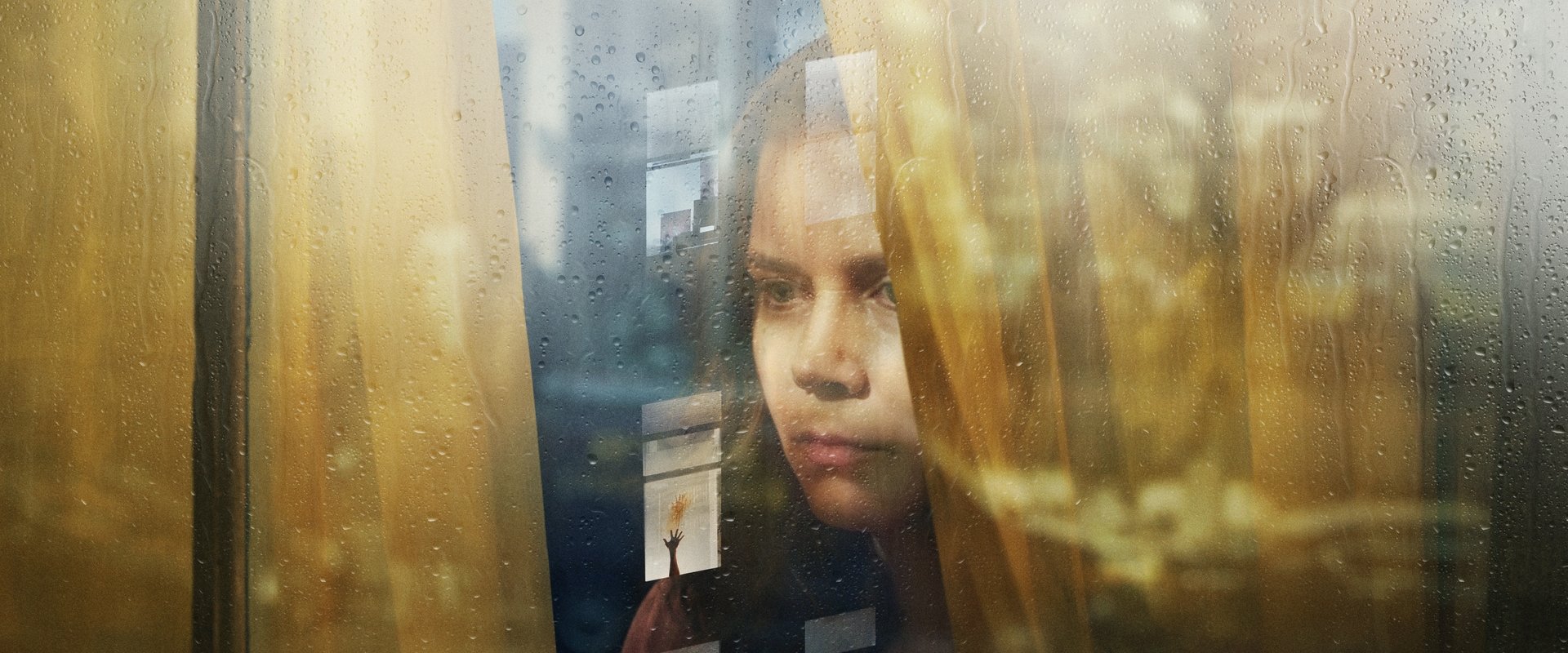 La mujer en la ventana