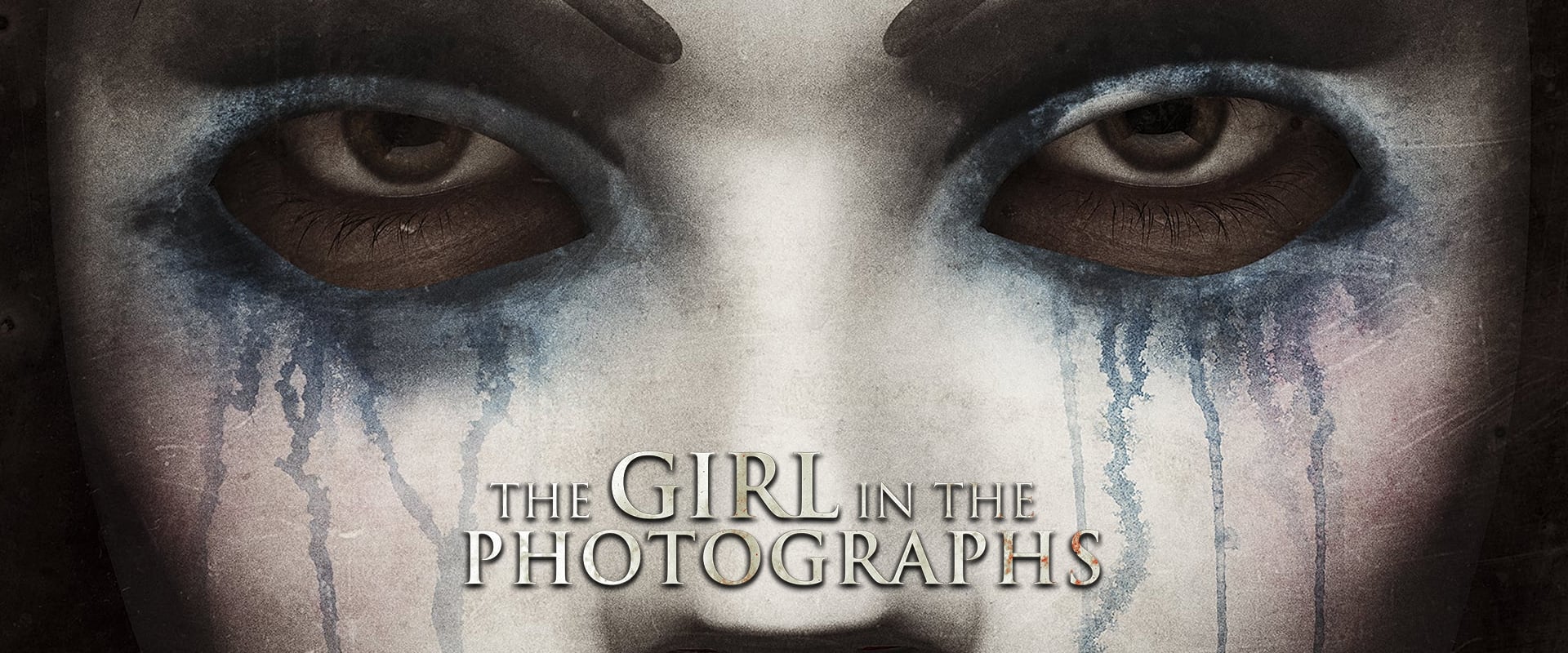 The Girl in the Photographs