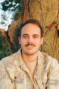 Profile of Toy Adams