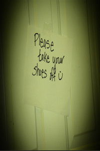 Please take your shoes off