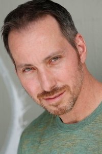 Profile of John Nyomarkay