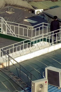 Poster for Bombay Tilts Down