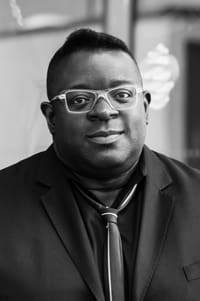 Isaac Julien as Himself in Daddy and the Muscle Academy