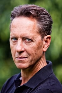 Richard E. Grant as Larry Oliphant in Mountains of the Moon