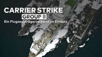 An aircraft carrier strike group in action