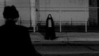 A Girl Walks Home Alone at Night