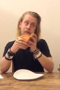 Macaulay Culkin Eating a Slice of Pizza - 2013 Macaulay Culkin Eating a Slice of Pizza - 2013