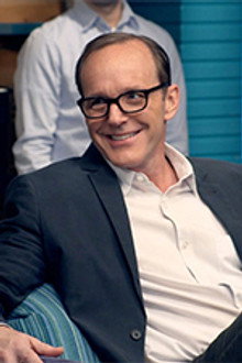 Clark Gregg Wears a Navy Blazer & White Collared Shirt