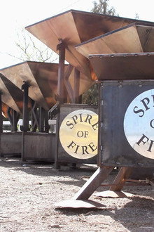 Planes, Pains, and a Spire of Flames