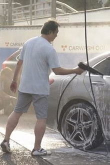 At a coin car wash after the rainy season