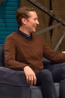 Nick Offerman Wears a Green Flannel Shirt & Brown Boots