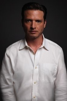 Photo of Aden Young