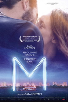 M.