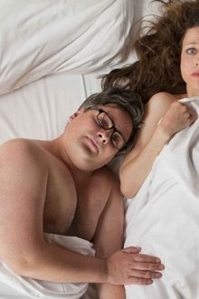 Drei in einem Bett