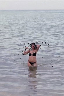 Hot Beach Babe Aims to Please