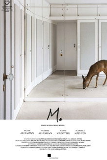 M.
