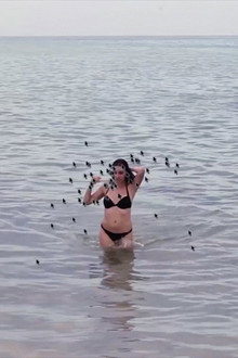 Hot Beach Babe Aims to Please